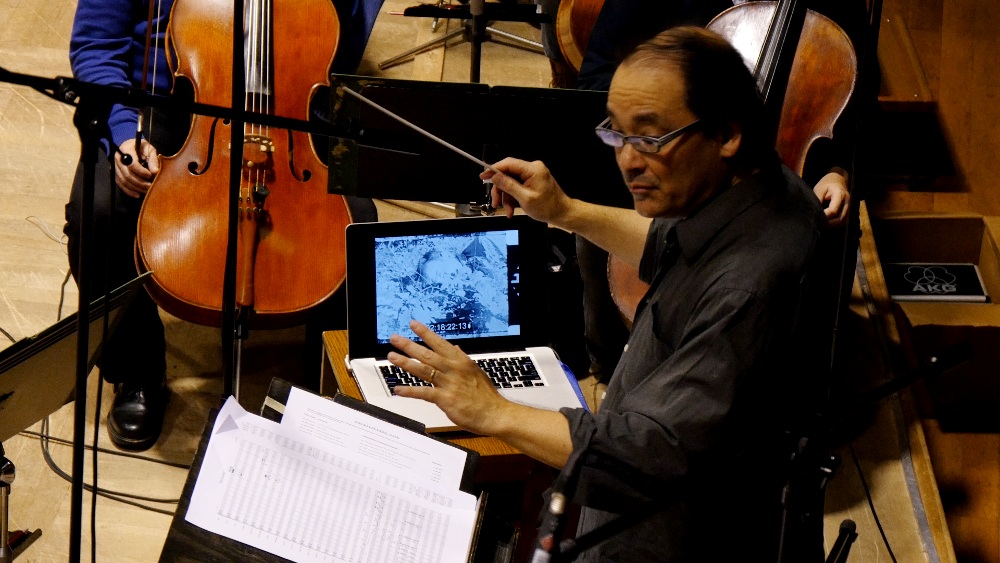 Robert Israel conducting the score for the film "The Cold Heart" (1933), exactly timed to the film. On the screen, you can see a scene with Franz Schnyder as Peter Munk.